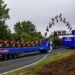This is the moment a daredevil motocross rider jumps between two moving trucks, not only backflipping between the HGVs but also clearing a motorway gantry at the same time. But the 'meticulously planned' trick stunt doesn't go entirely to plan...