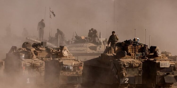 Thousands of Israeli reservists report for duty as military chief clashes with ministers