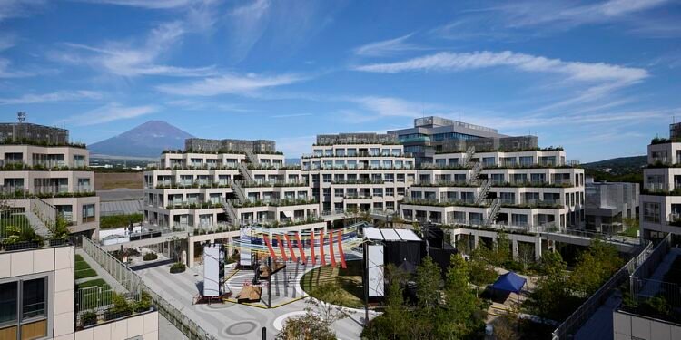 Toyota's Woven City has been created at the foot of Mount Fuji on the grounds of the car maker's disused factory. Thousands of its staff members will move in with their families to test e-mobility solutions, robotaxis and smart home features