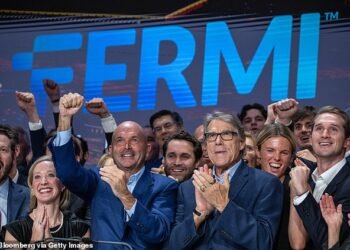 Fired up: Toby Neugebauer, centre left, and Rick Perry, centre right, at Fermi's listing