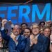 Fired up: Toby Neugebauer, centre left, and Rick Perry, centre right, at Fermi's listing