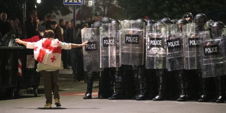 Georgian police clash, detain protesters as ruling party says it won local elections