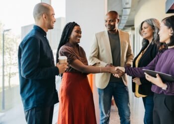 People shaking hands.