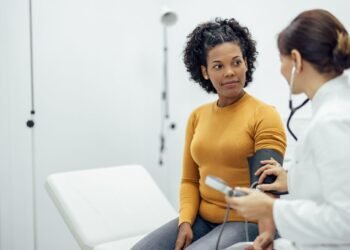 Adult with doctor