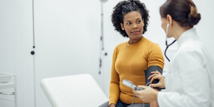 Adult with doctor
