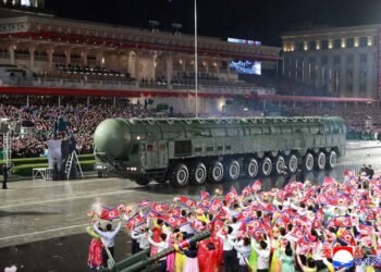 North Korea holds military parade, shows off new intercontinental missile