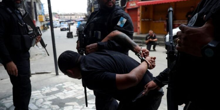 Rio police raids kill 60 ahead of climate conferences, source says