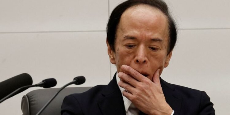 Bank of Japan drops fresh hints of near-term rate hike as yen slides