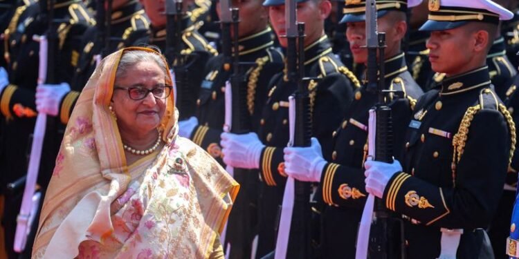 Exclusive-Ahead of Hasina court verdict, son warns of Bangladesh violence if party ban stays