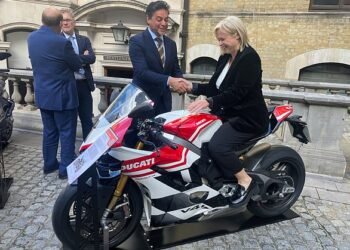 In the fast lane: Anna Botting pictured with Ducati UK managing director Fabrizio Cazzoli