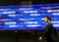 Asian stocks slip; yen firms as Ueda comments boost rate hike hopes
