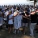 Australian Jews hold prayers, hundreds of surfers paddle out at Bondi to honour shooting victims