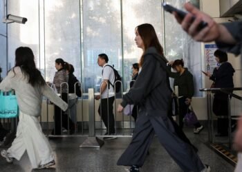 China’s statistics bureau revises down 2024 final GDP