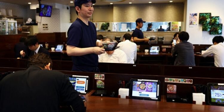 Japan's services sector sustains solid growth in November, PMI shows