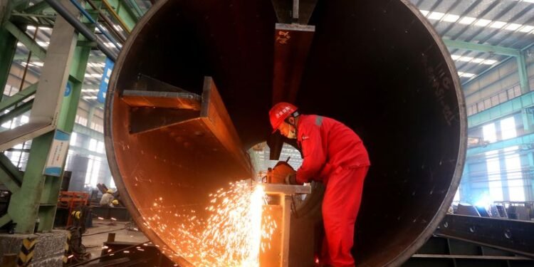 Asia’s factories end 2025 on firmer footing as orders pick up