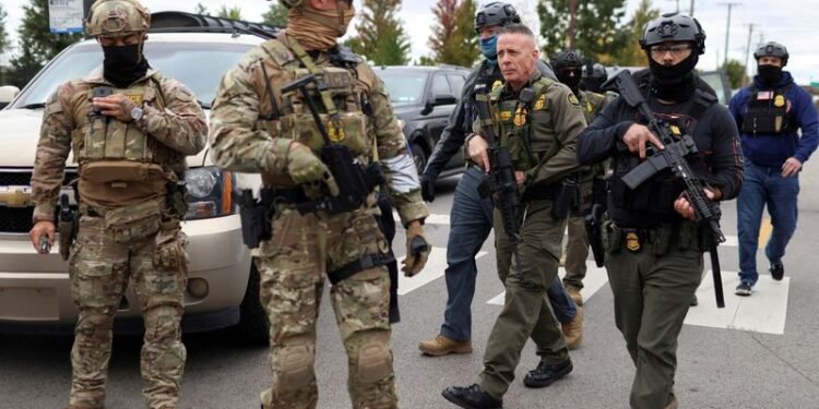 Chicago mayor tells police to probe allegations of illegal activity by immigration agents