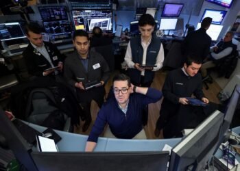 Dow ends lower, with S&P flat, as Intel’s outlook weighs on risk appetite