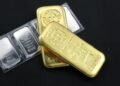 Gold surges past $5,000 for first time as silver tops $107 on safe-haven buying