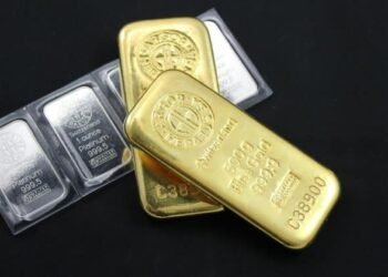 Gold surges past $5,000 for first time as silver tops $107 on safe-haven buying