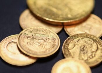 Gold’s blistering rally continues past $5,200 as dollar plunges