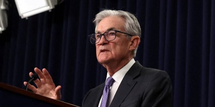 Investors react as Trump-Fed feud escalates