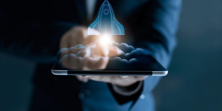 Startup concept, transparent rocket is launching and flying out of tablet on screen