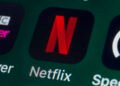 Netflix’s stock remains under pressure as investors balk at forecast and Warner Bros. acquisition