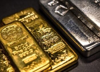 Silver tops $100 as gold nears $5,000 on extraordinary metals rally