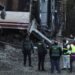 Spain deploys heavy machinery to find missing bodies among train crash wreckage