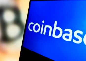 Stocks making the biggest moves midday: COIN, ANET, CVX, HAL