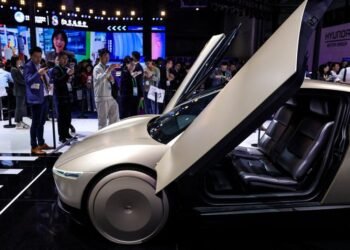 Tesla plans $20 billion capital spending spree in push beyond human-driven cars