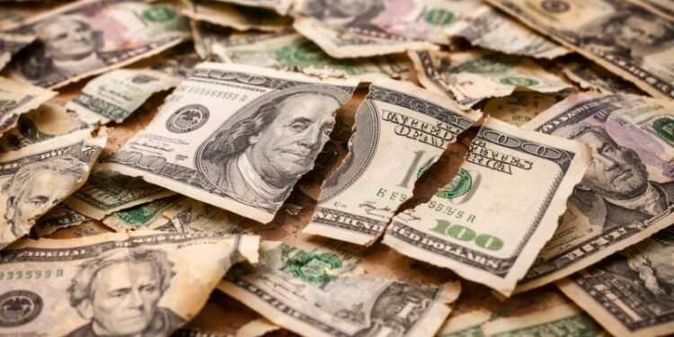 US dollar slides toward steepest weekly drop in seven months on policy uncertainty