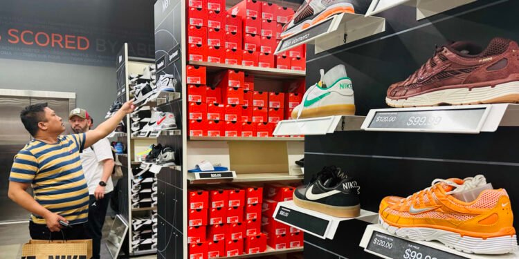 Why Nike is cutting hundreds of jobs, starting at its warehouses