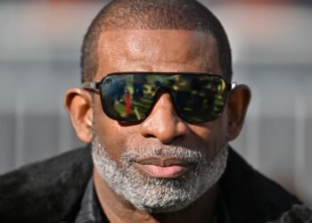 ‘These are college students … not NFL players.’ Deion Sanders’s new $5,000 fines for Colorado players blur the lines around professional sports.