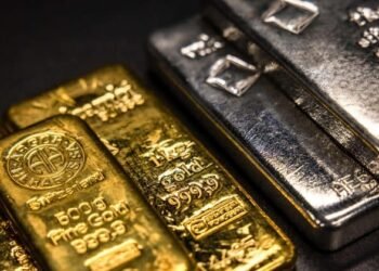 Gold and silver slide after record highs as profit-taking hits metals and markets