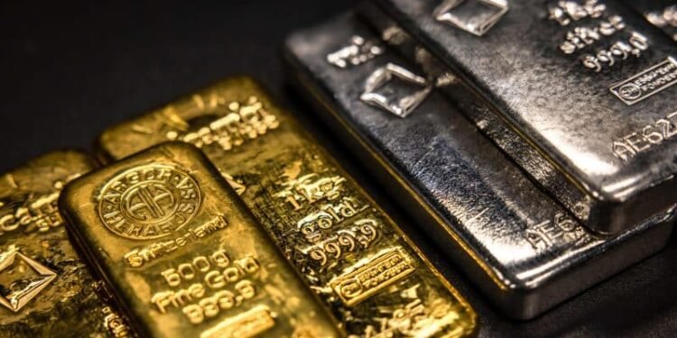 Gold and silver slide after record highs as profit-taking hits metals and markets