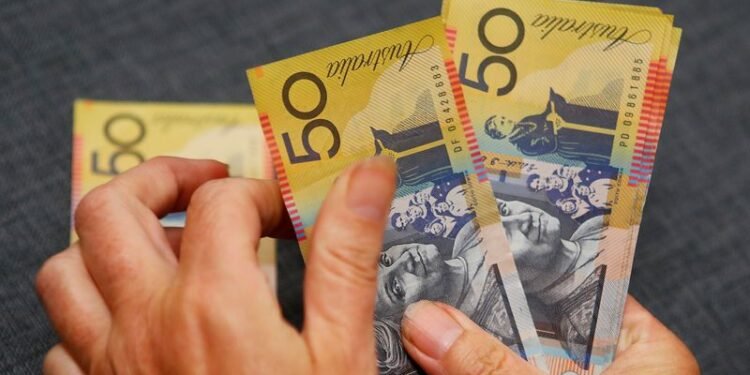 Major Australian pension fund says Aussie dollar undervalued, boosts currency holding