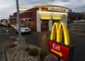 McDonald’s says value meals are bringing back customers, but it still expects a tough year ahead