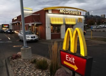 McDonald’s says value meals are bringing back customers, but it still expects a tough year ahead