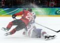 Olympics-Ice hockey-US claim long-awaited gold by beating rivals Canada in overtime thriller