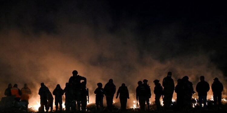 Residents protest as authorities burn cash left on ground by Bolivian plane crash