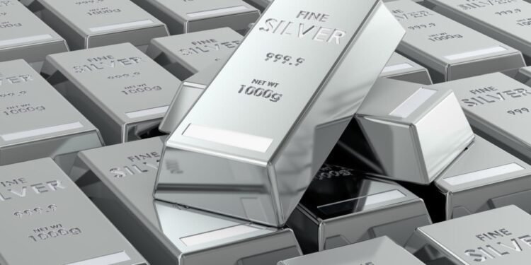 Silver falls as much as 13% as the volatility continues in metals