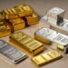 Silver, gold tumble as stronger dollar hits precious metals