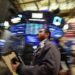 Tech lifts Wall St higher as markets weigh commodity selloff, earnings
