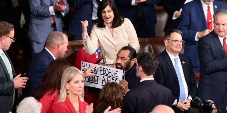 US Rep. Al Green escorted from House chamber during Trump speech