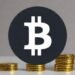 Bitcoin briefly touches $76,000 ahead of key economic decisions this week
