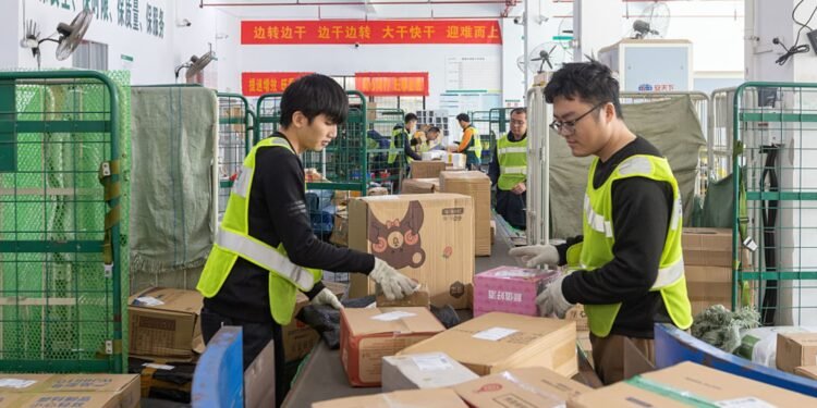 China's factory output and consumption beat forecasts, while property investment contraction slows