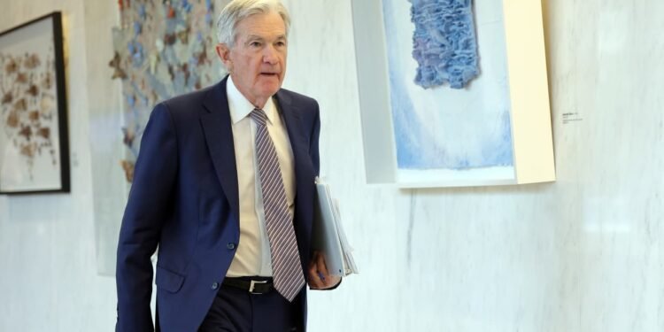 Fed chief Powell says risks to economy suggest rates could go lower or higher