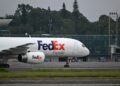 FedEx is getting more upbeat about the year, despite surging fuel costs