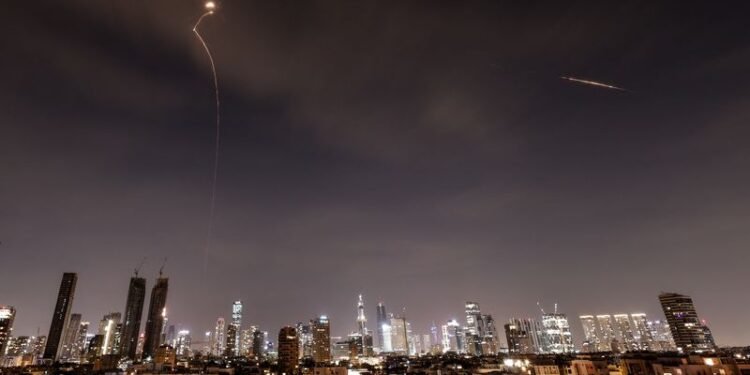 Iran sends waves of missiles into Israel, dismisses Trump’s talk of negotiations as ’fake news’